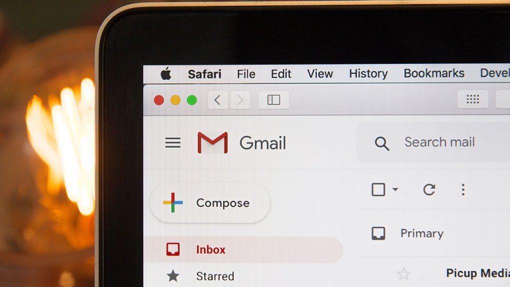 Laptop monitor showing the Gmail logo